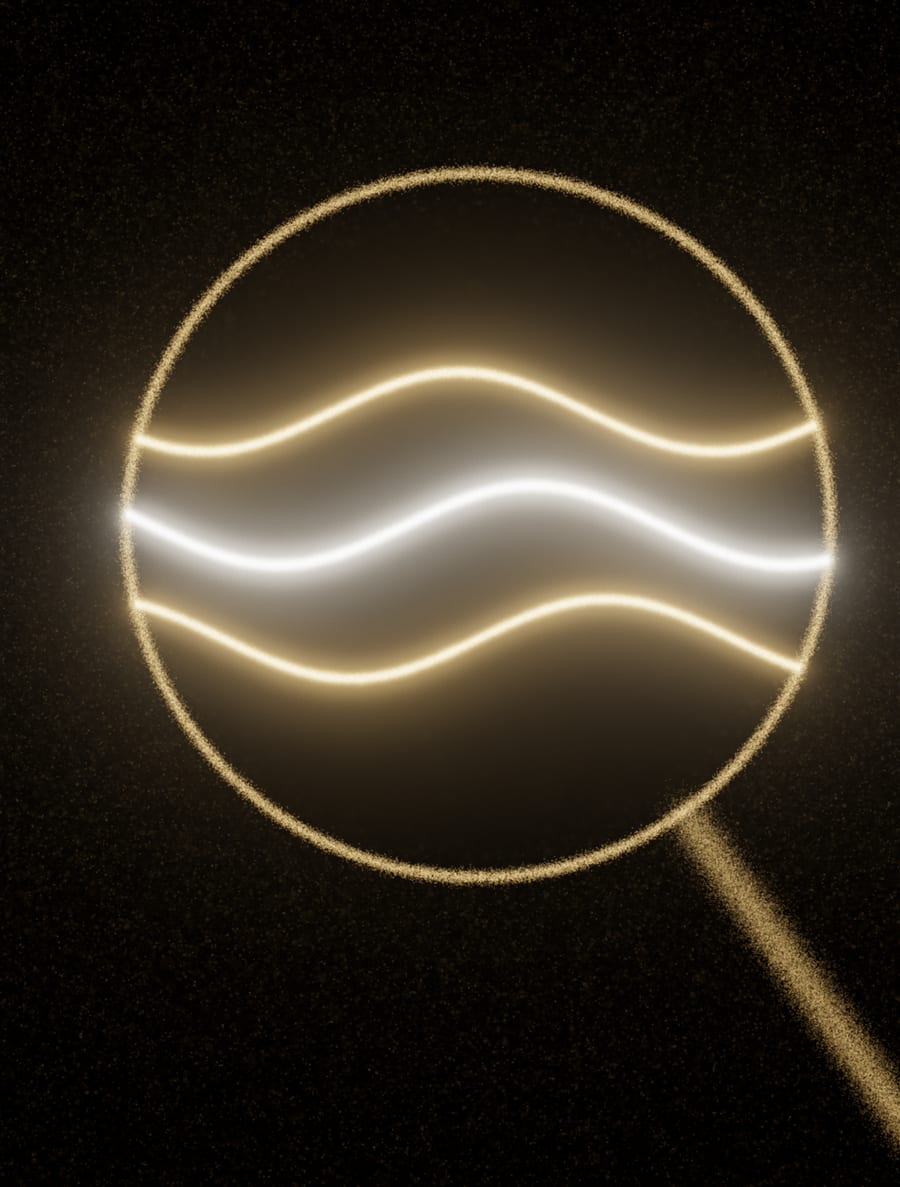 A lens of light over scattered dust, resolving it into clean waves